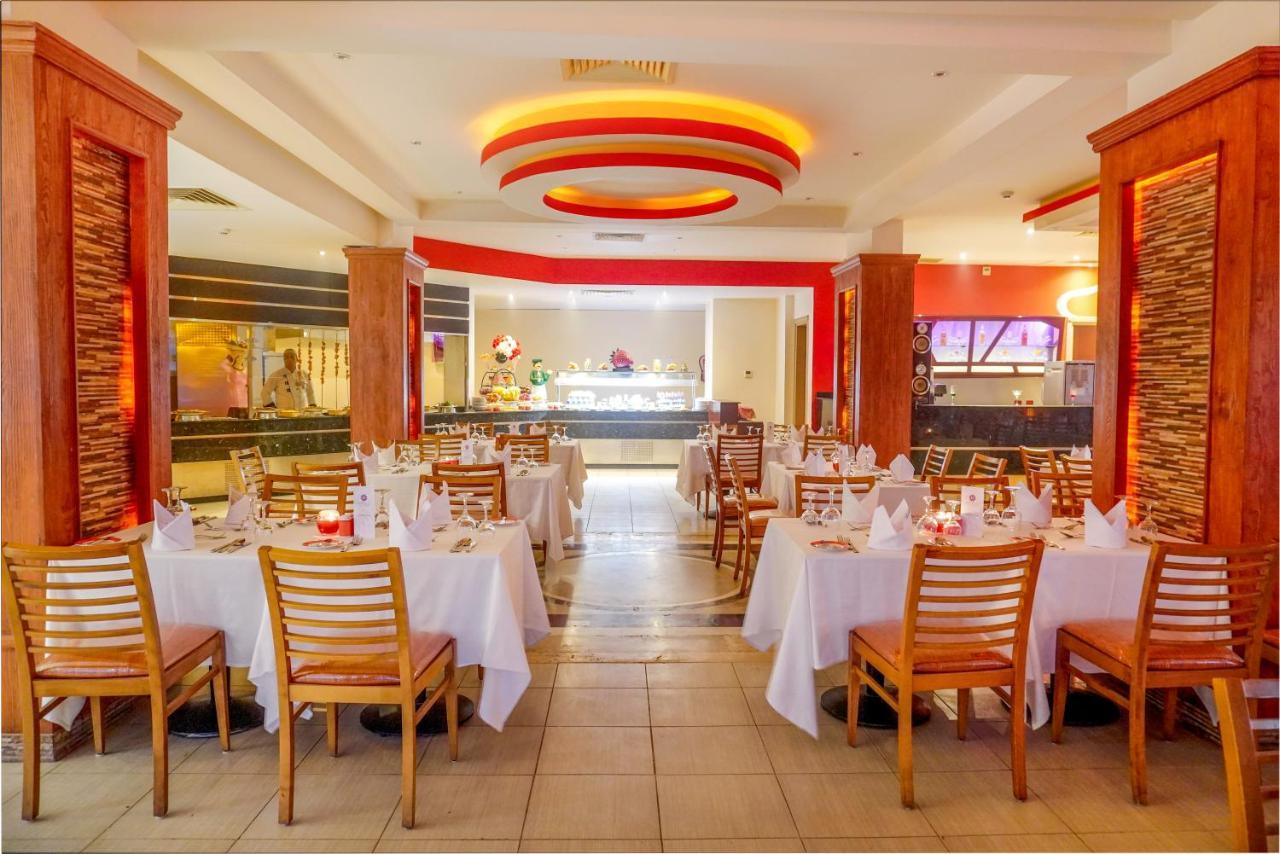 Charmillion Club Aquapark Hotel Шарм ел-Шейх Екстериор снимка The interior of the restaurant