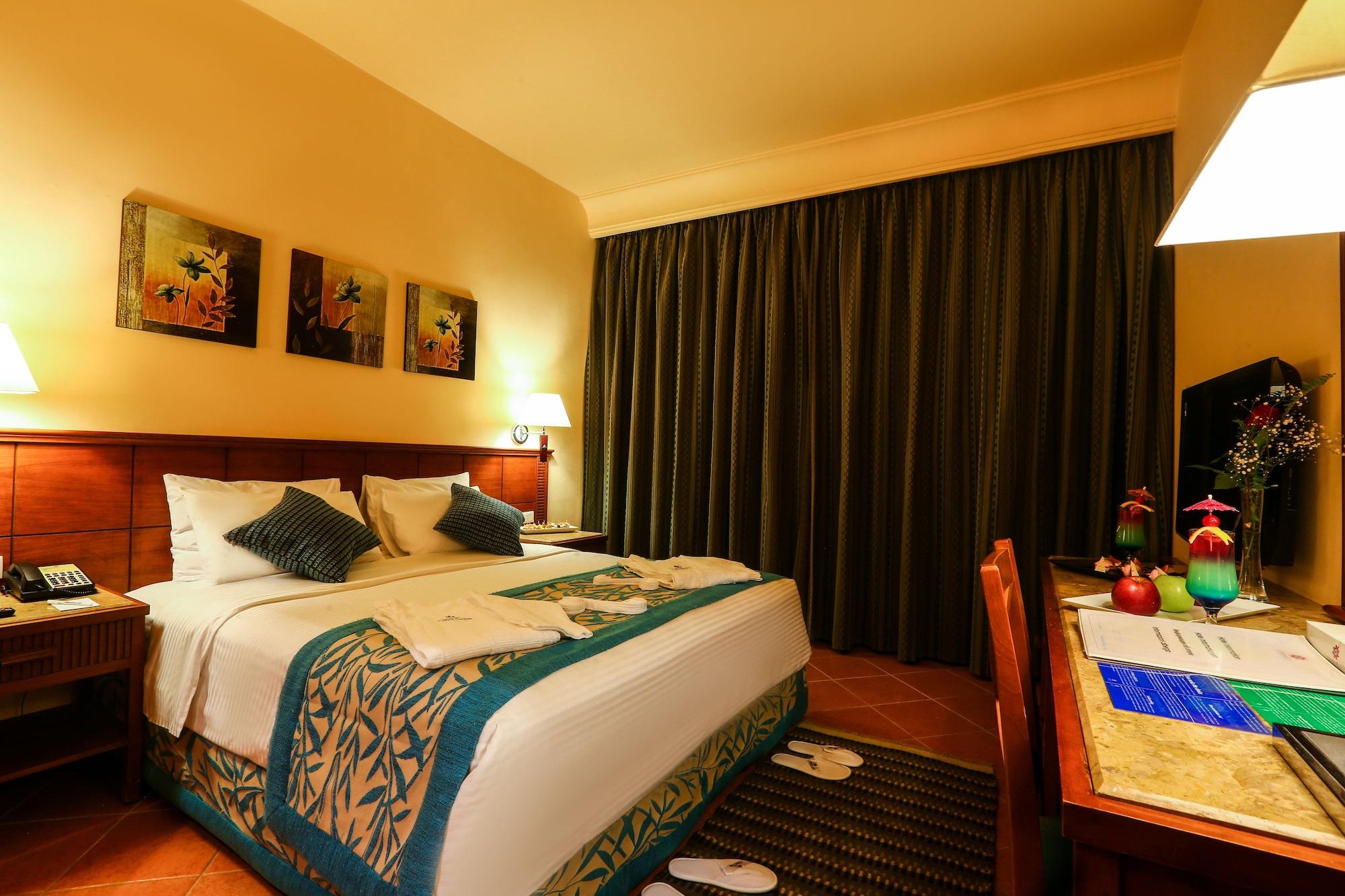 Charmillion Club Aquapark Hotel Шарм ел-Шейх Екстериор снимка A bedroom at the hotel