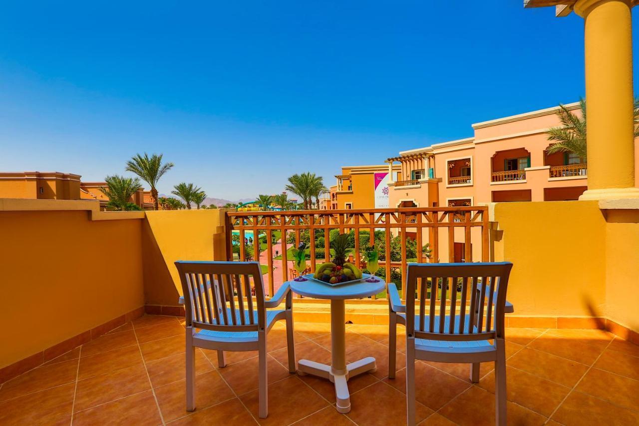 Charmillion Club Aquapark Hotel Шарм ел-Шейх Екстериор снимка A balcony in a hotel